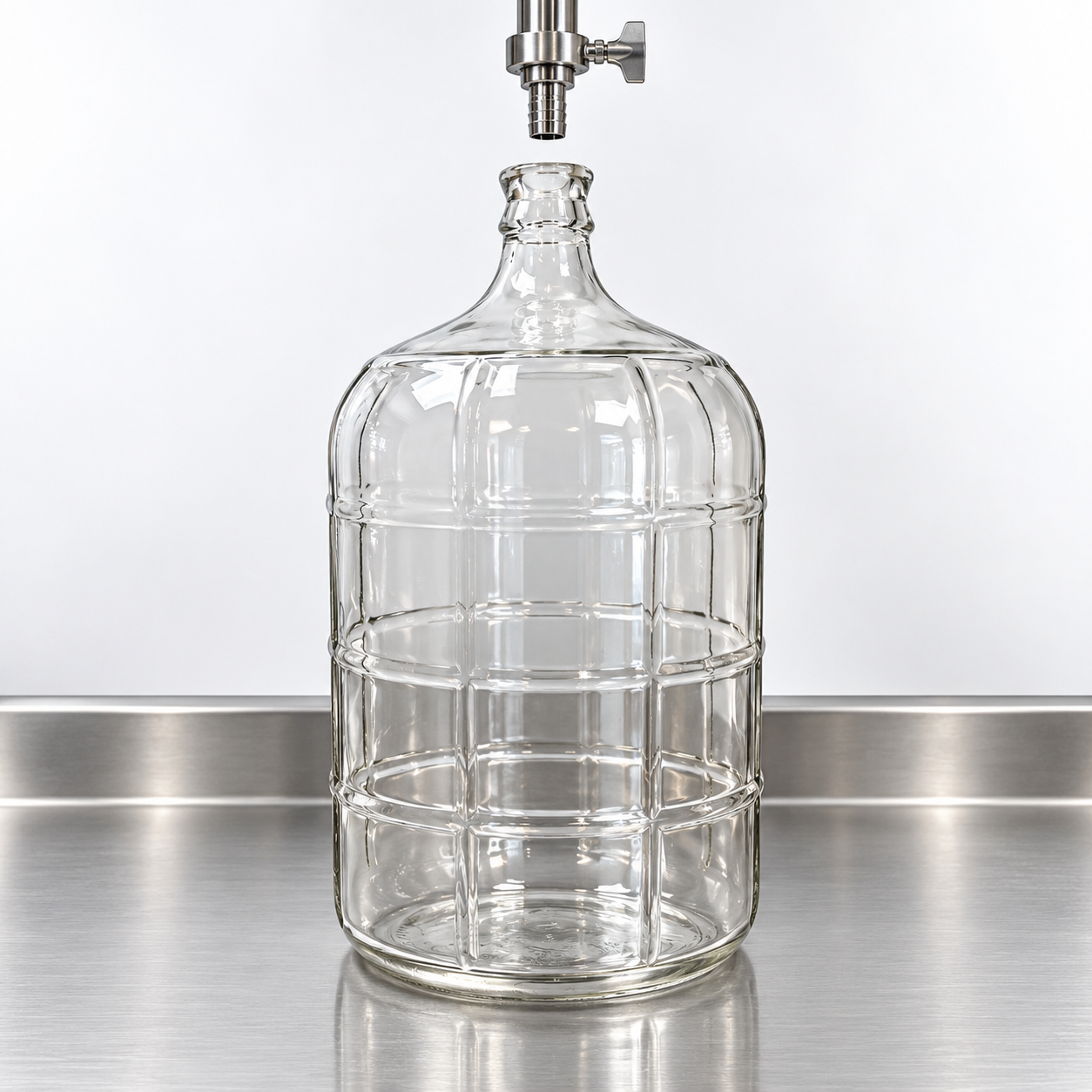 5 gallon Italian glass water carboy being filled at Puretap Water Distillers Mississauga